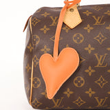 BAGCHARM ORANGE TEKSTUR HJERTE