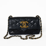 1980-tals Chanel svart quiltad lammskinn Vintage Single Flap Bag