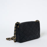 1980-tals Chanel svart quiltad lammskinn Vintage Single Flap Bag