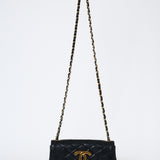 1980-tals Chanel svart quiltad lammskinn Vintage Single Flap Bag