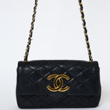 1980-tals Chanel svart quiltad lammskinn Vintage Single Flap Bag