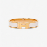 HERMÈS HERMES CLIC H GULD/HVID